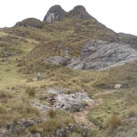 Old Spanish adits in lower part with silicifications with dark sulphides and oxides, and brecciated decalcifications in the top of the hill with Fe, Mn, Cu oxides.