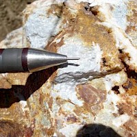 Drusy quartz textures at crackle breccias.