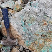 Photo 2: Exposed Porphyry at North Target Quartz-secondary biotite-sericite-iron oxides-copper oxides, with intense stockwork of quartz-iron oxides-copper oxides
